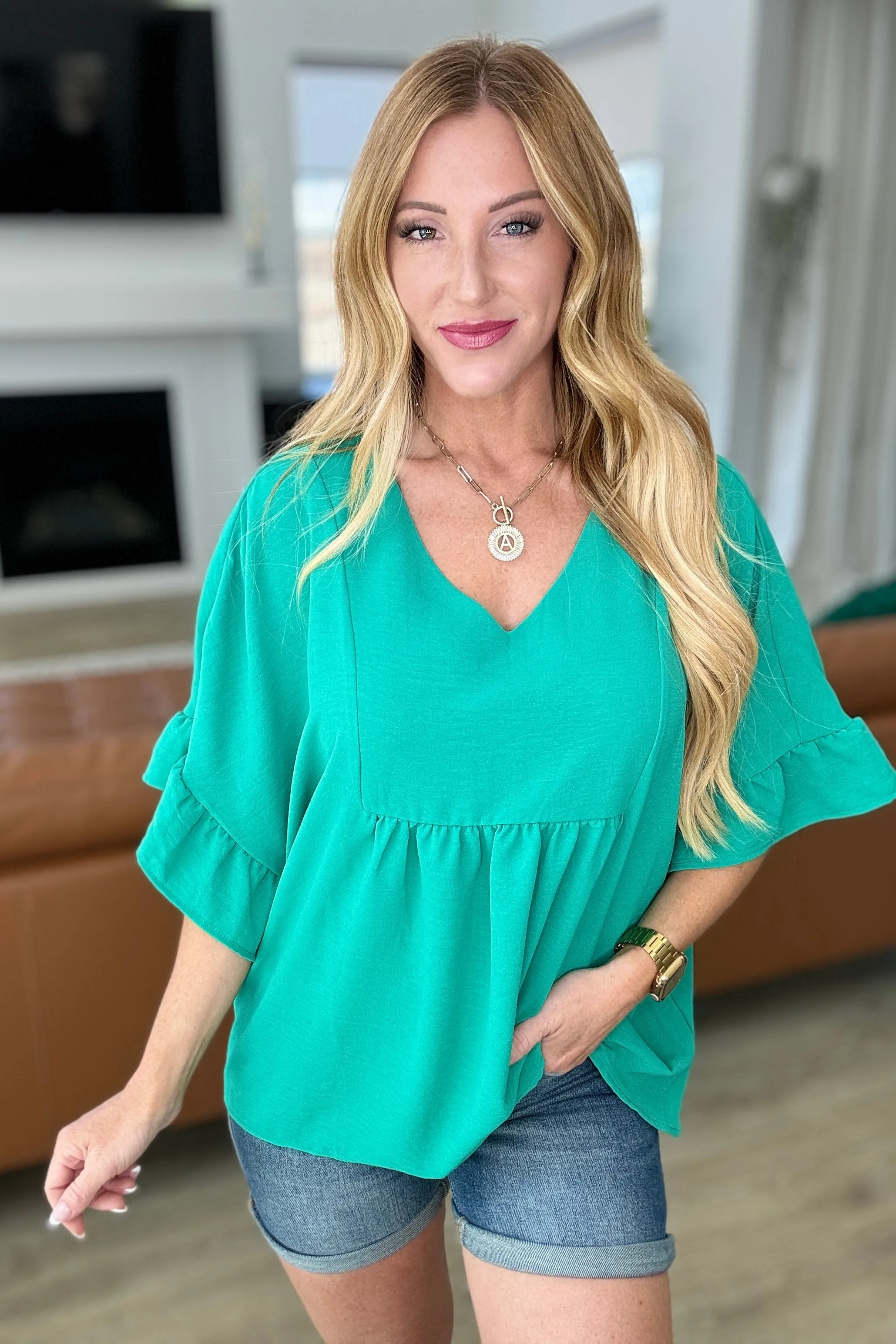 Airflow Peplum Ruffle Sleeve Top in Emerald - 4/24