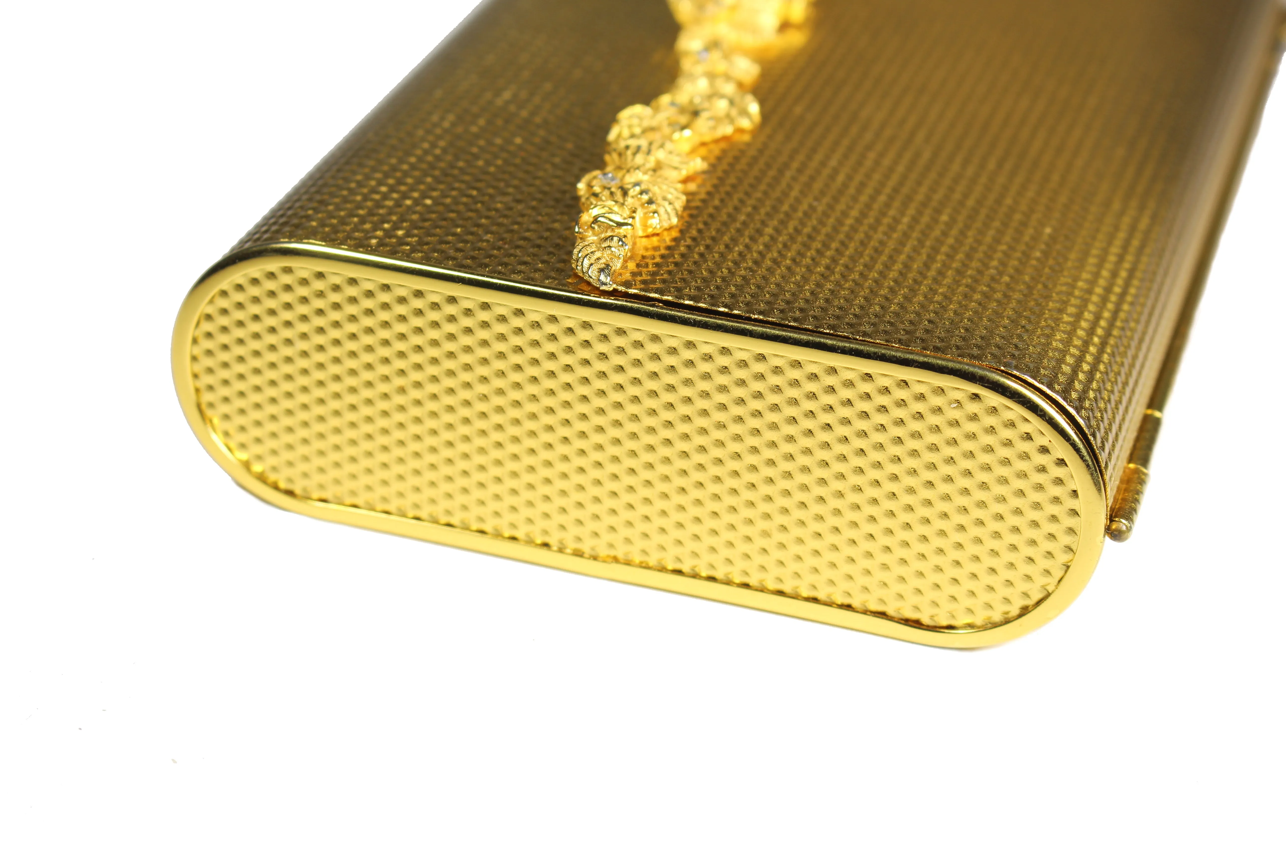 COBLENTZ embossed golden metal clutch