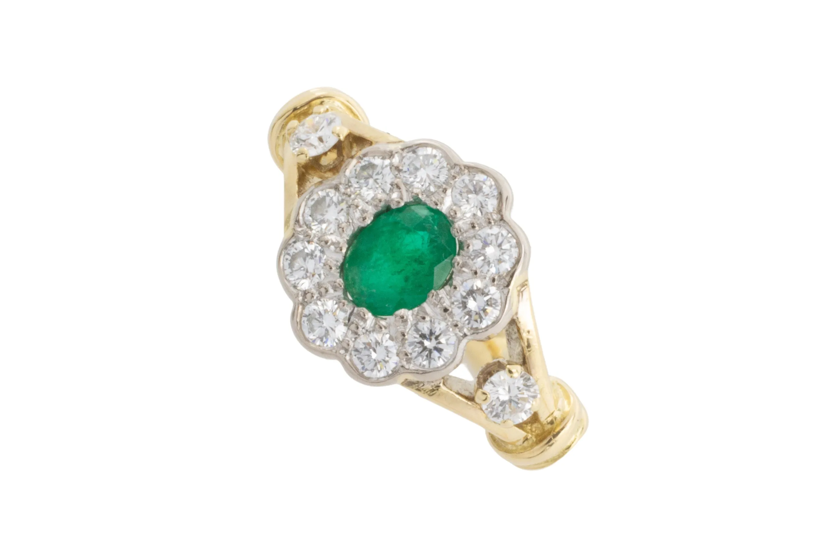 Emerald and diamond ring in 18 carat gold