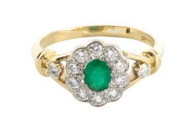 Emerald and diamond ring in 18 carat gold