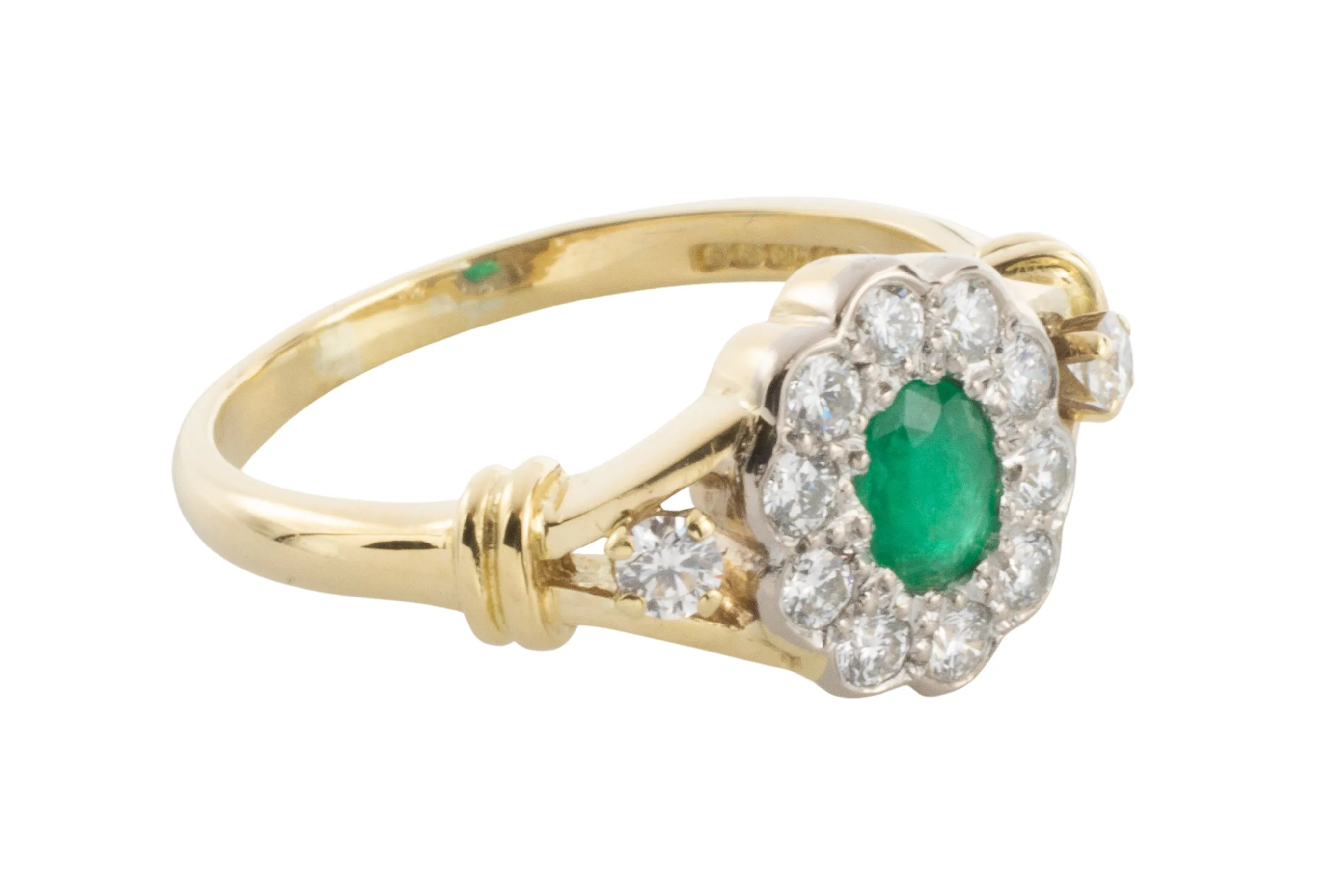 Emerald and diamond ring in 18 carat gold