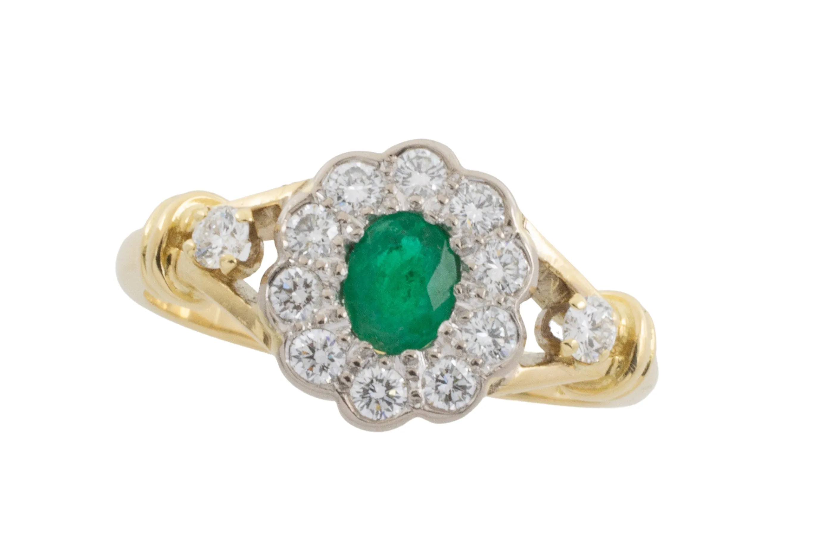 Emerald and diamond ring in 18 carat gold