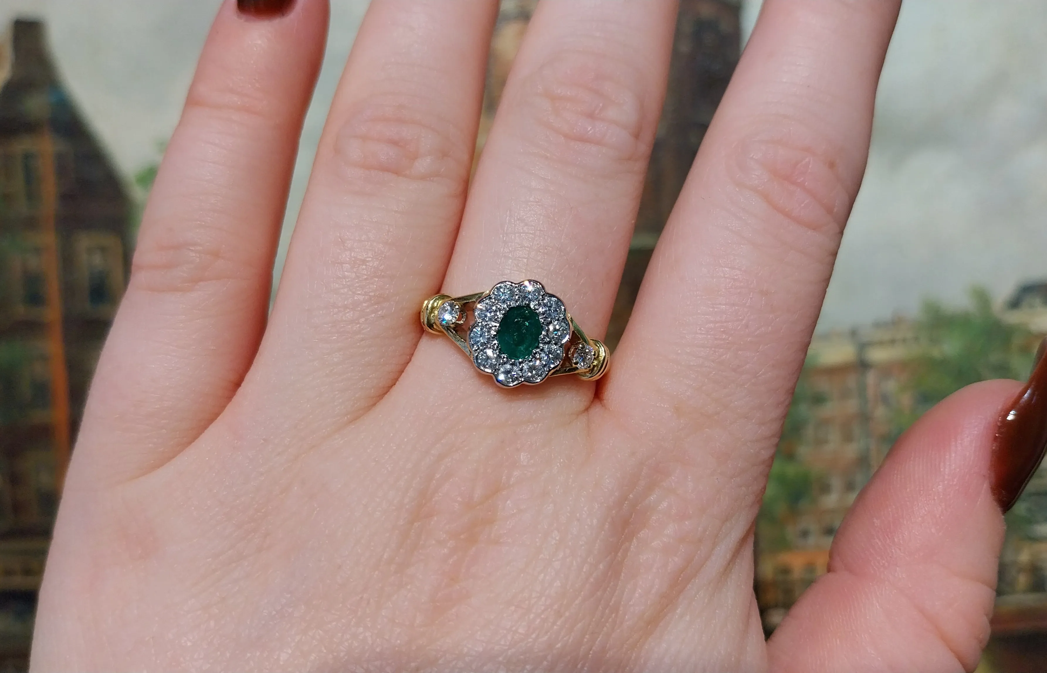 Emerald and diamond ring in 18 carat gold