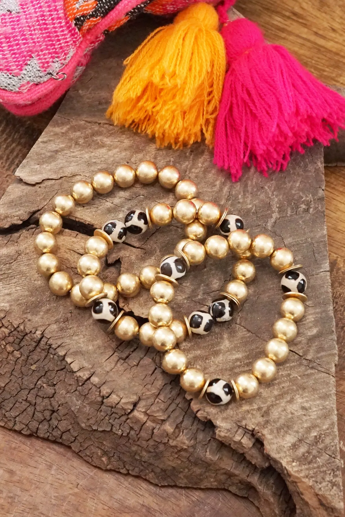 Gold beads bracelet stack of 3 with ceramic animal print beads