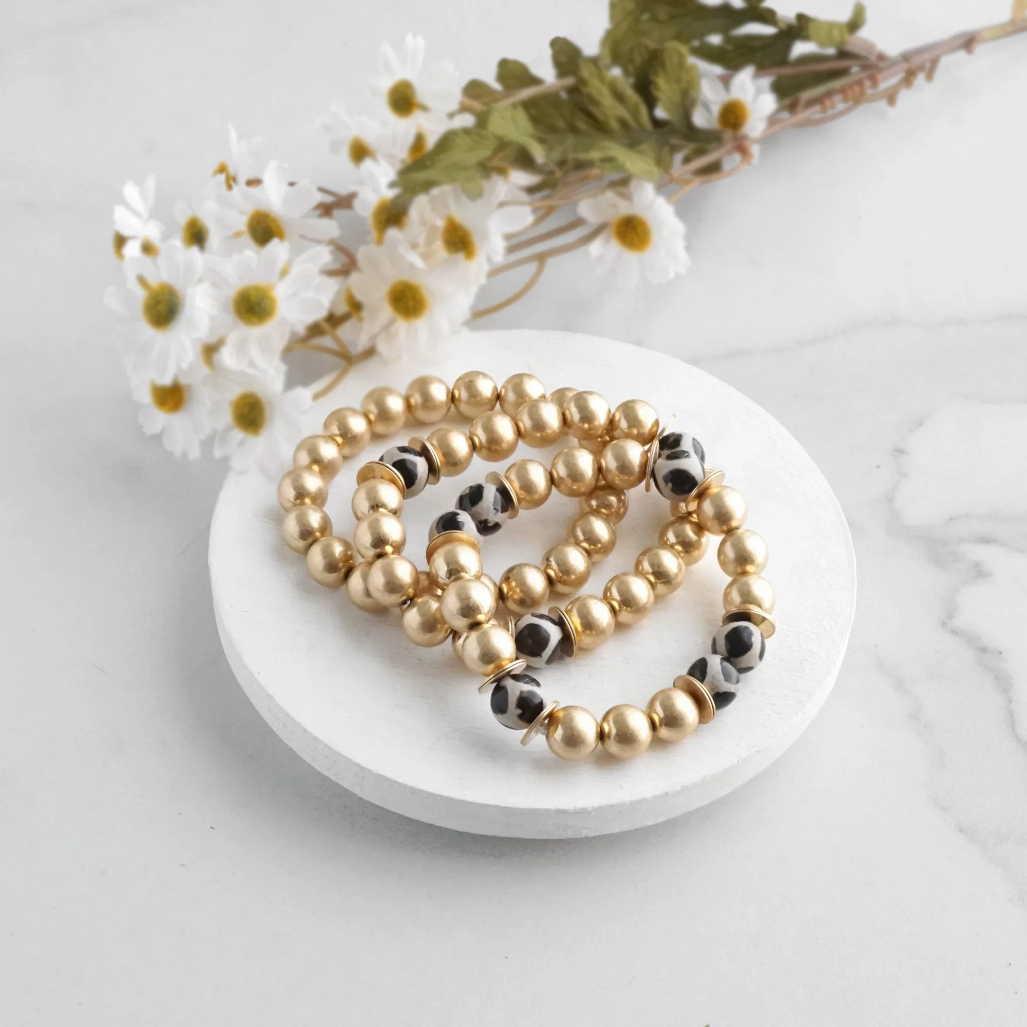 Gold beads bracelet stack of 3 with ceramic animal print beads