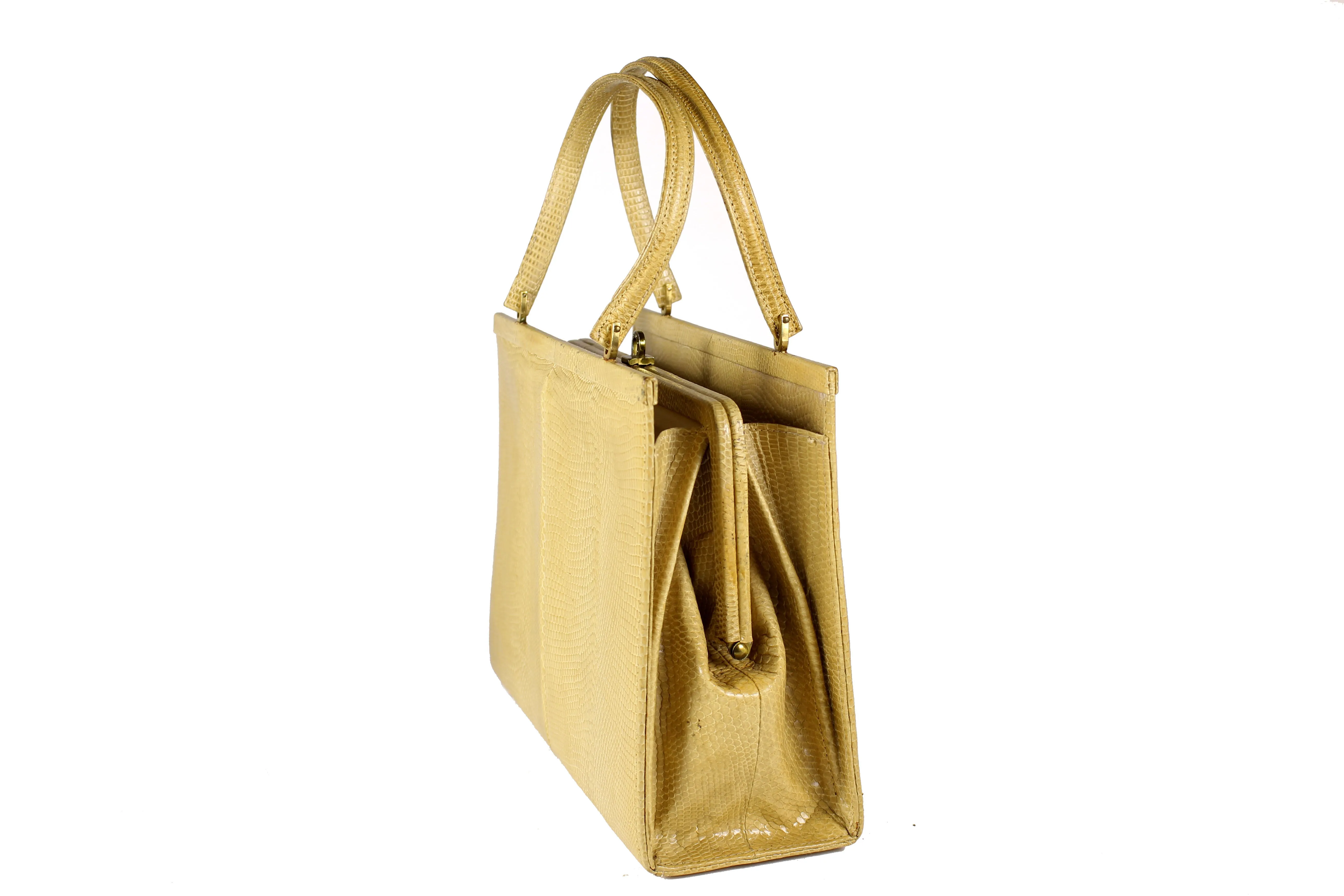 Lizard cream-colored frame handbag