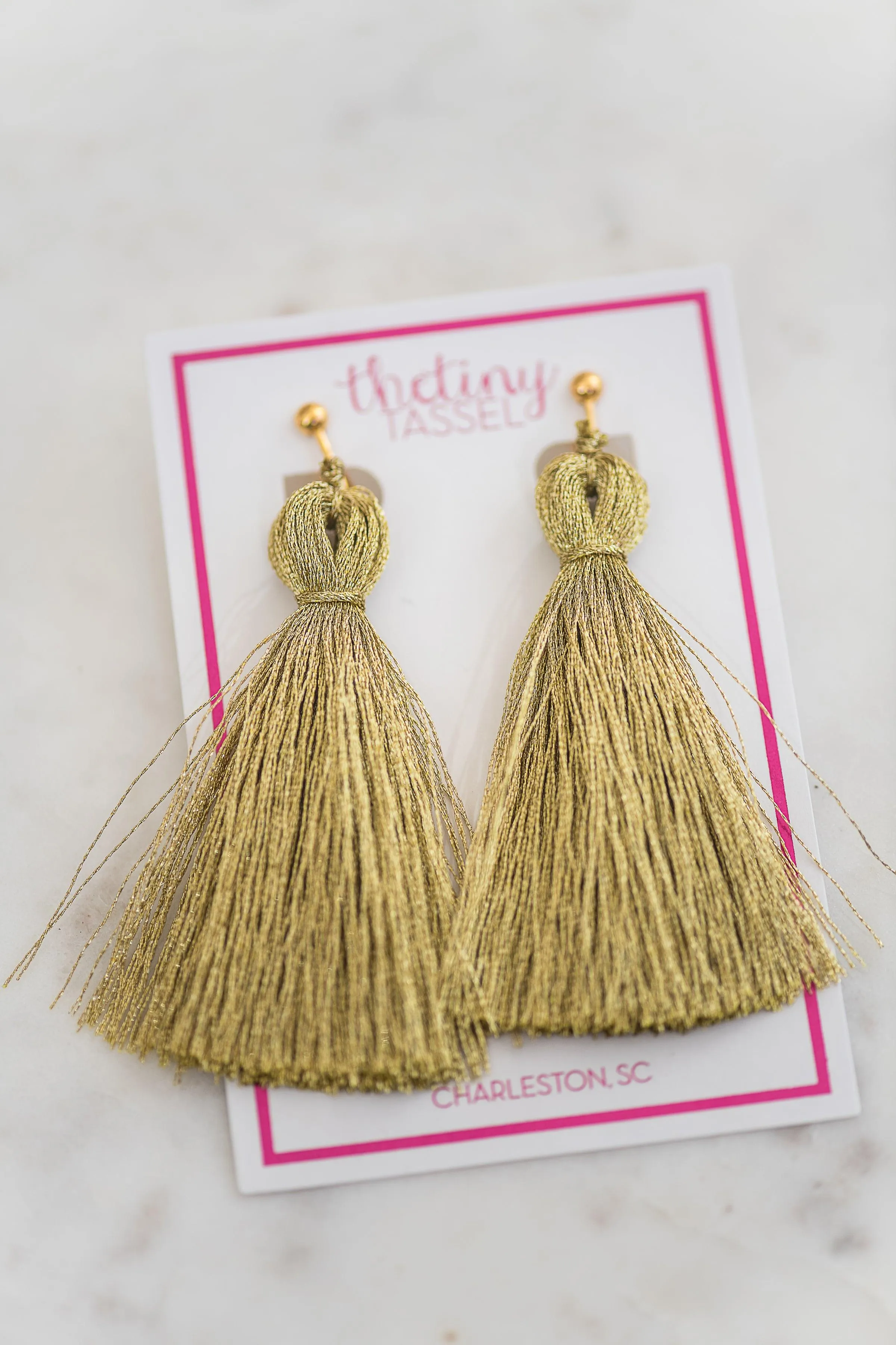 The St. Margaret Clip-On Tassel Earring in Gold